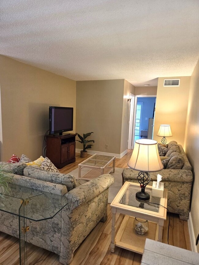 Building Photo - Over 55 Community! Adorable Furnished One ...
