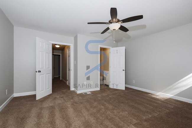 Building Photo - Move in before January 15th and choose your reward: a $250 Amazon Gift Card or a 55" Smart TV!