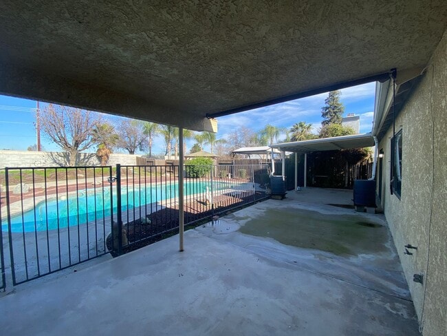 Building Photo - Get ready for Summer in this 3 BD 2 BA SW home with a Pool on a corner lot