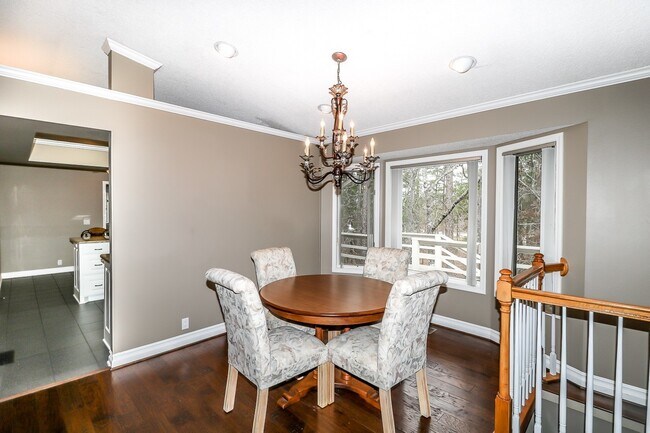 Building Photo - Beautiful 4 Bedroom, 3 Bath home. It has a 2 car garage plus a 1 car carport.  Stay warm in the w...