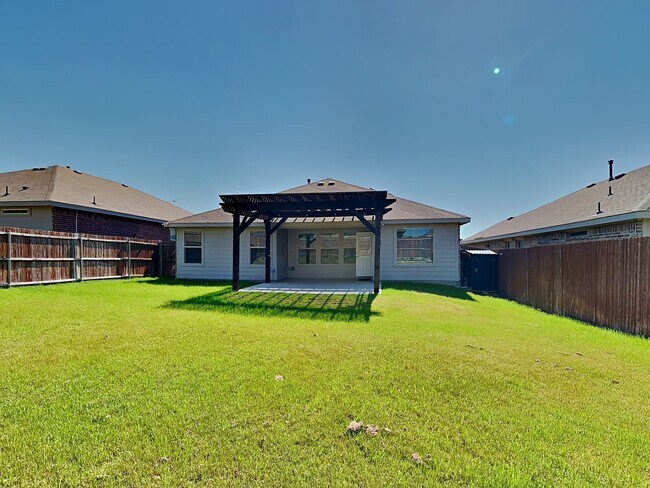 Building Photo - Chapel Creek Beauty with Designer Kitchen, Spacious Layout & Private Backyard Retreat!