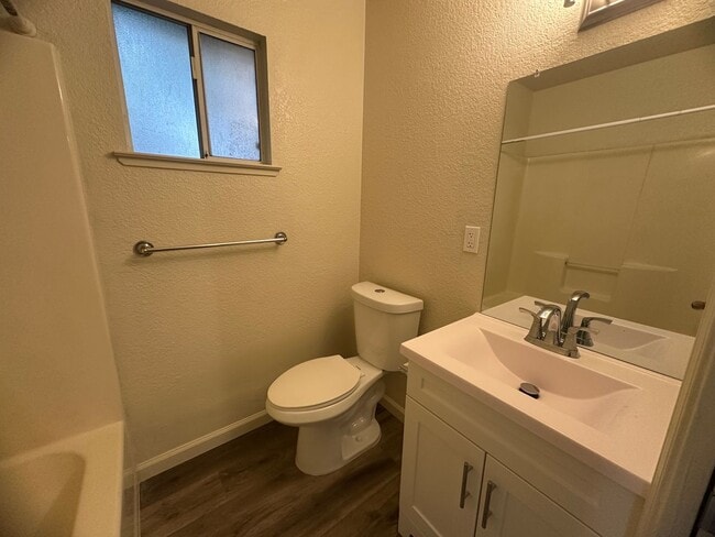 Building Photo - Three Bedroom 2 Bathoom with Large Yard