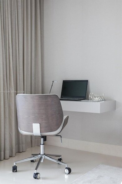 Building Photo - 10201 Collins Ave