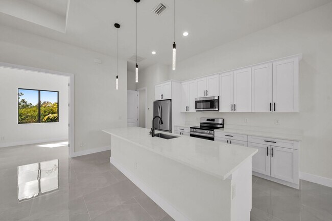 Building Photo - Single family for rent in Port Charlotte. New construction. 3+Den/ 2 bath. City water.