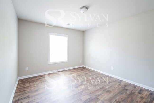 Building Photo - Embrace the charm of this 4 BR, 2.5 BA home