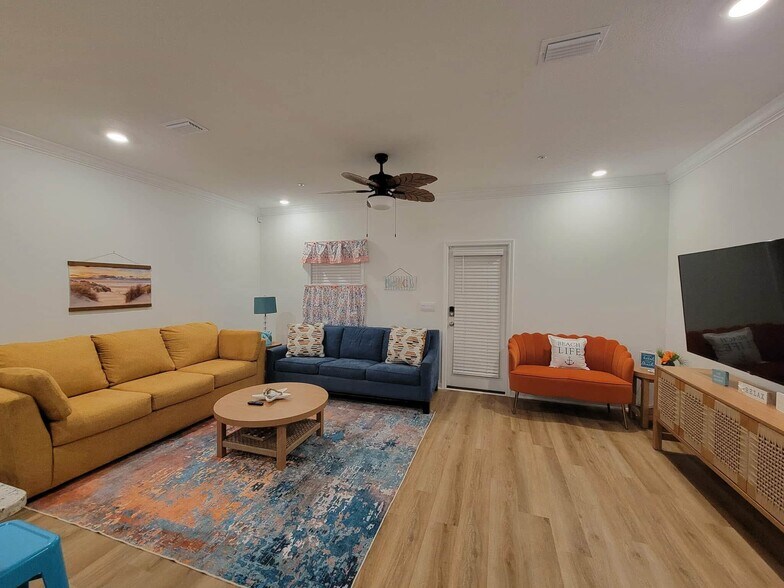 Large living room with 65” tv - 4209 Lost Bay Dr