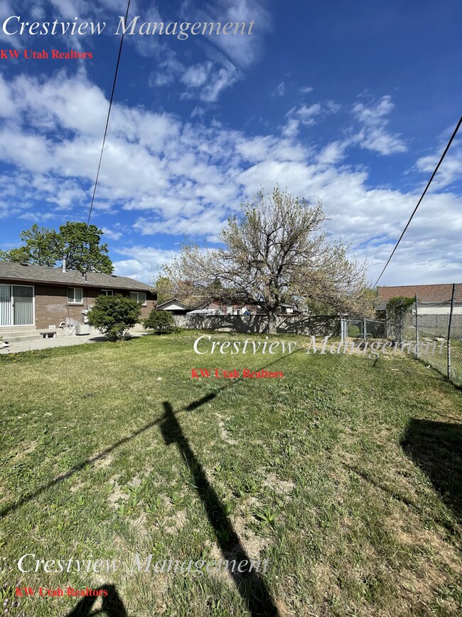 Building Photo - Charming 4-Bedroom Home in West Valley City – Spacious & Convenient Location- 1st month's rent Free!