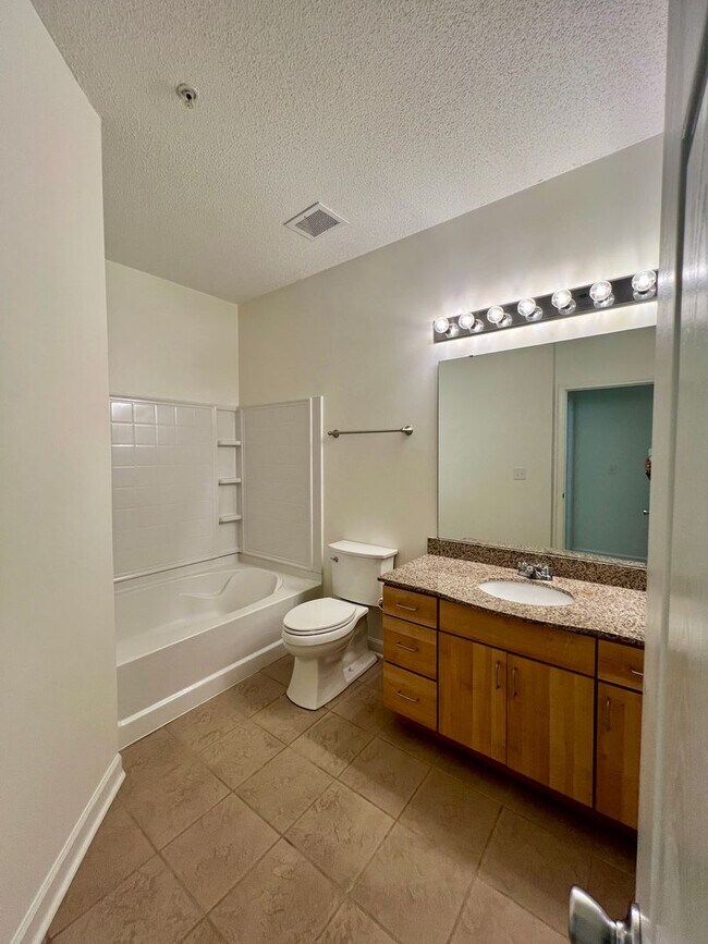 Building Photo - 3-Bed, 2-Bath Condo with Garage! One month...