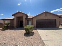 Building Photo - 1241 S Wagon Wheel Dr