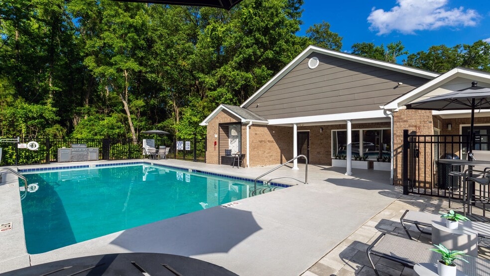 Take a dip or lounge poolside at our resort-style pool deck! - The Grays at Old Town