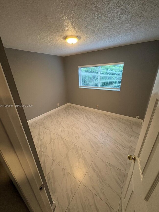 Building Photo - 3901 NW 9th Ave