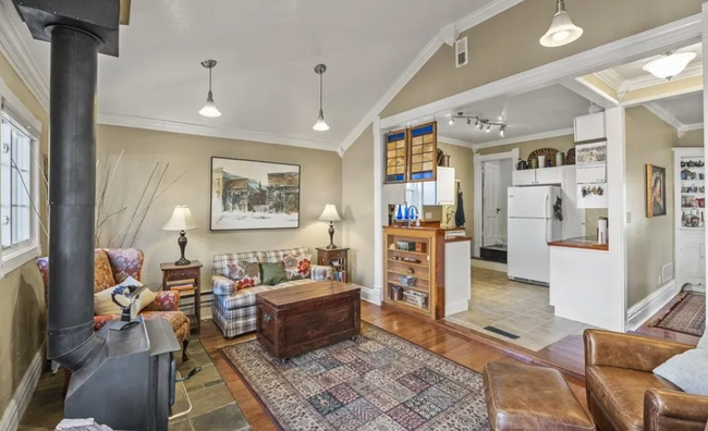 Back living room onto kitchen - 812 E Cache La Poudre St