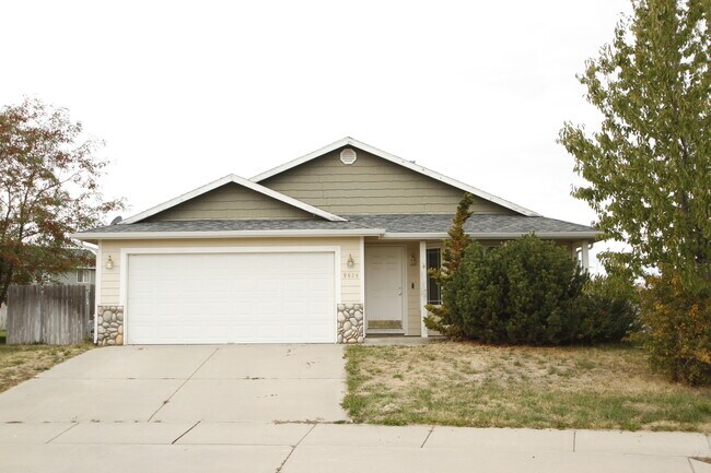 Two car attached garage and plenty of driveway parking. - 9624 Spencer Ct