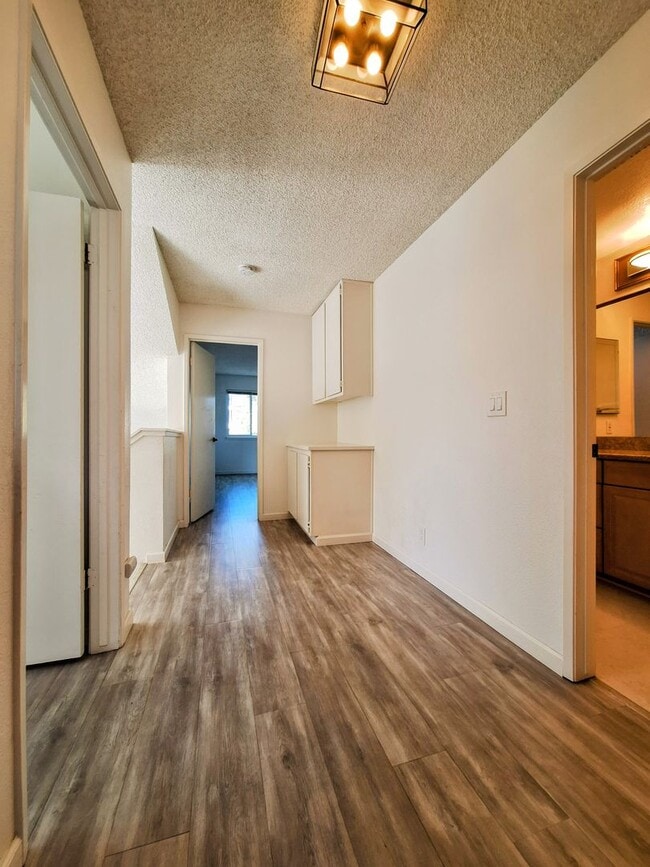 Building Photo - Spacious Two-Story 3bd Townhouse With Private Patios, Balcony, & Garage