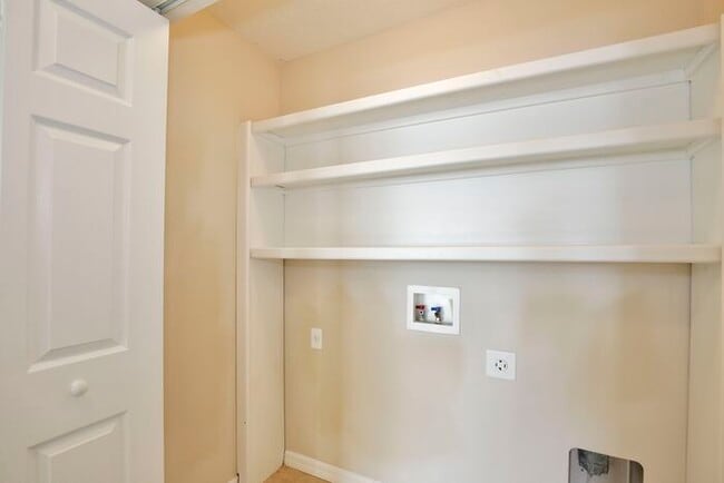 Building Photo - Spacious 3/2.5 End-Unit with Breathtaking Lake Views in Sanford!