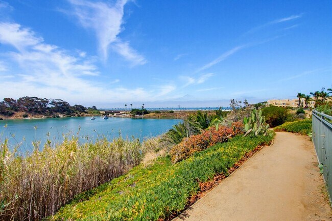 Building Photo - Carlsbad Condo West of 5 Freeway with Lagoon Access - Available Now!