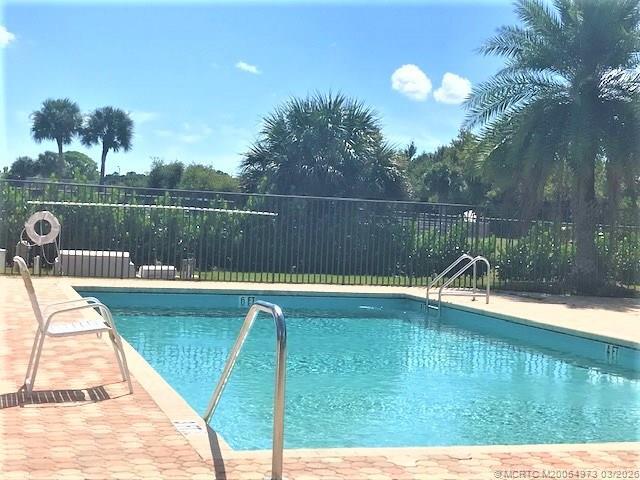 Building Photo - 3486 SW Pindo Palm Ln