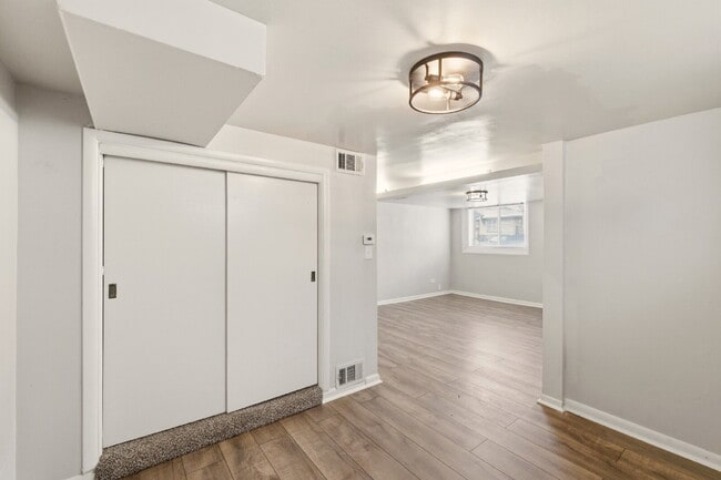 Building Photo - Price Drop! Renovated studio with garage + utilities included! Modern kitchen with island, update...