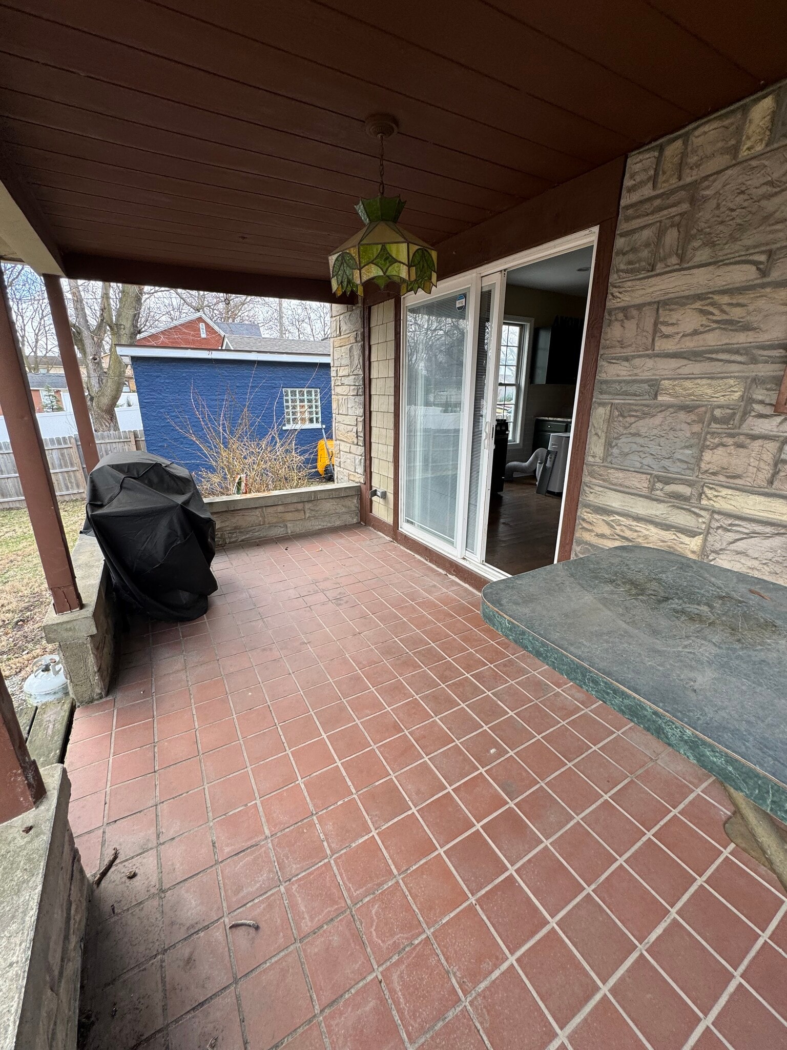 Covered back porch - 41940 E Ann Arbor Trl