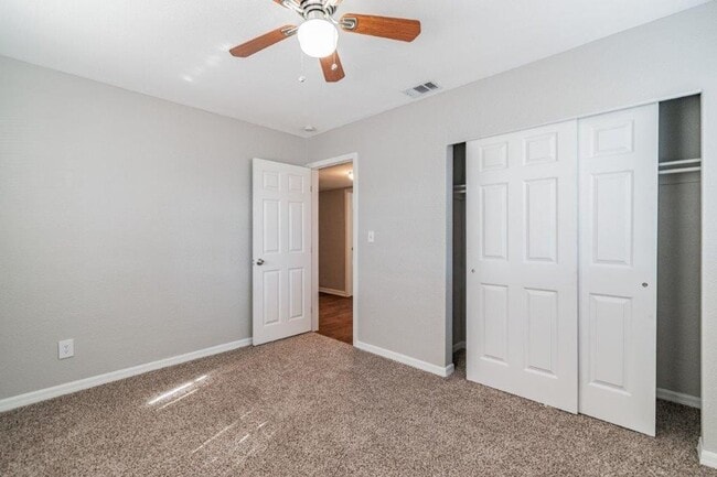 Building Photo - PRICE JUST REDUCED 3/2/1 1389 Sq. Ft. on a...