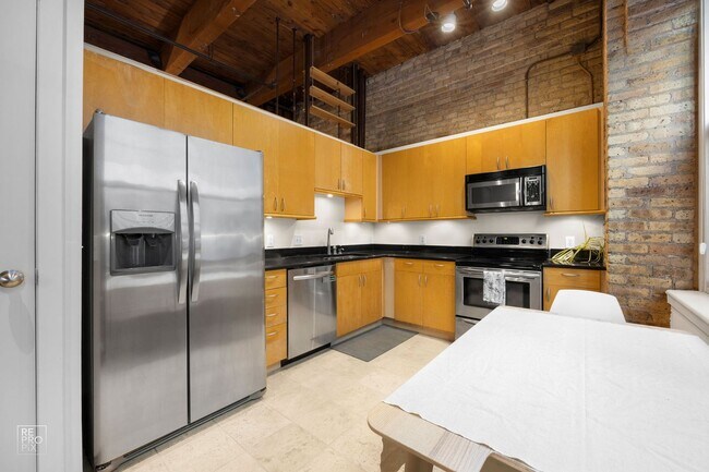 Building Photo - Lakefront Loft in a Historical Building with Every Convenience