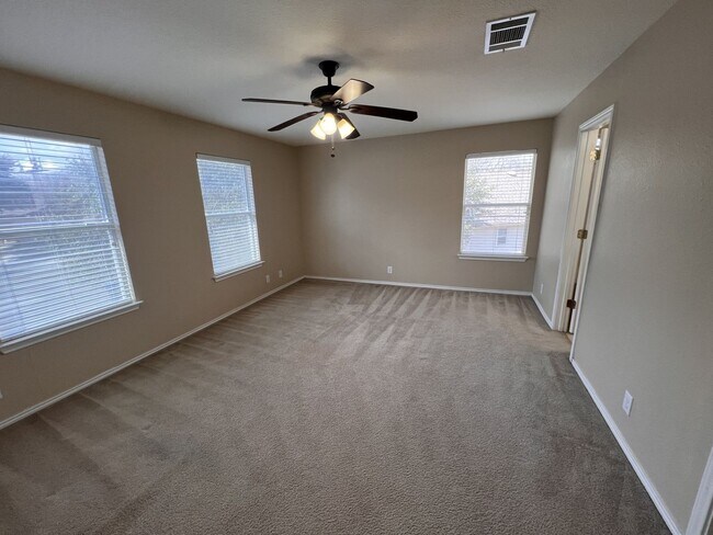 Building Photo - Generous Outdoor Space & Lawn Care Included!