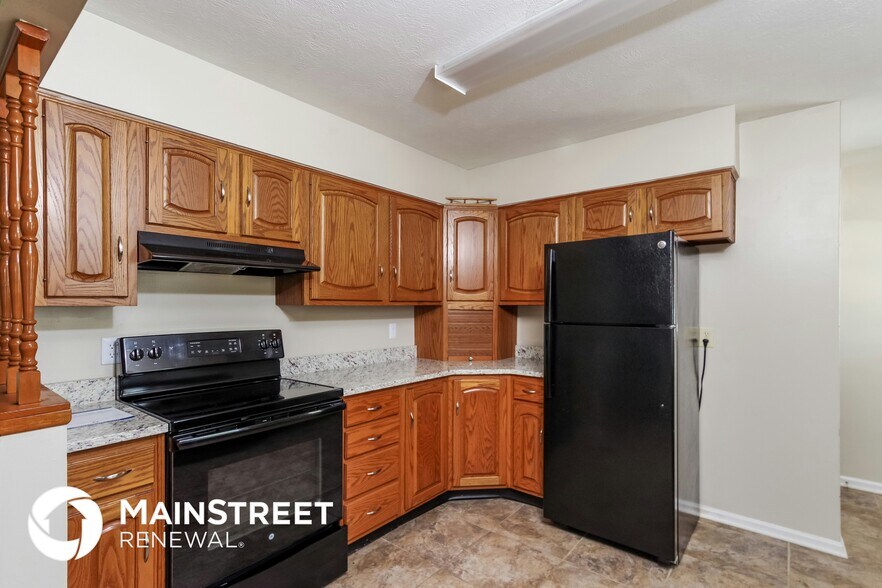 Building Photo - 8003 Canna Dr
