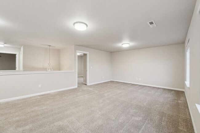 Building Photo - Well maintained 4-Bedroom 2.5 bath Graham home w/ Multiple Living Areas