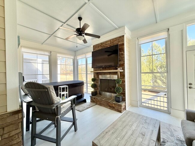 Building Photo - Luxurious 3BD, 4BA Raleigh Townhome with a First Floor Master Bedroom, Bonus Sunroom, and Large U...