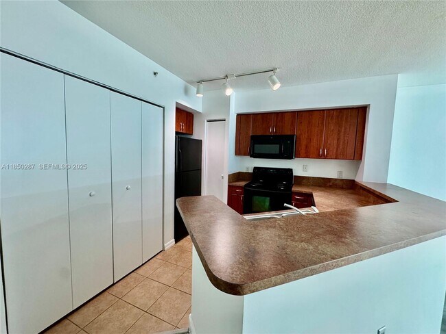 Building Photo - 9201 Collins Ave