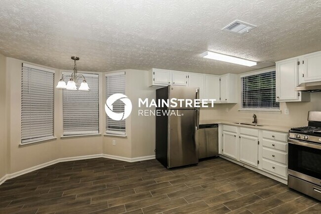 Building Photo - 3 Bedroom Pet-Friendly Home in REX, GA with Main Street Renewal