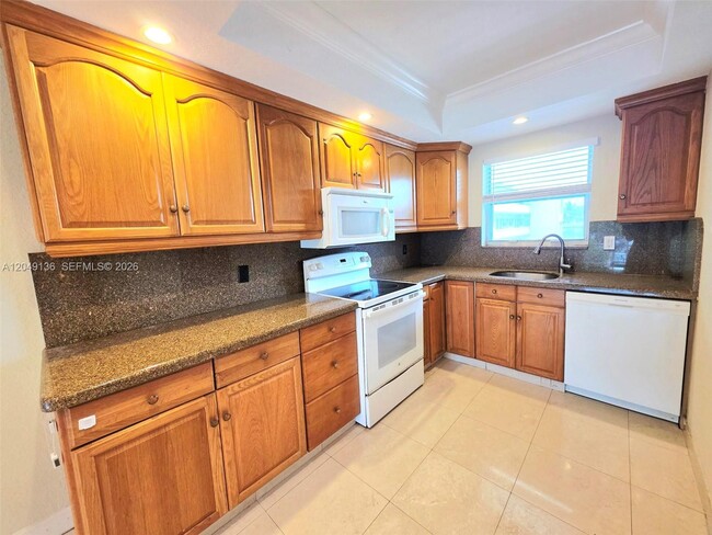 Building Photo - 1400 NE 57th Ct