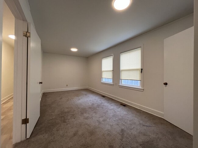 Building Photo - Expansive 4BR 2,900+ Sq Ft Home with Theater-Style Living Room & Bonus Hobby Workshop