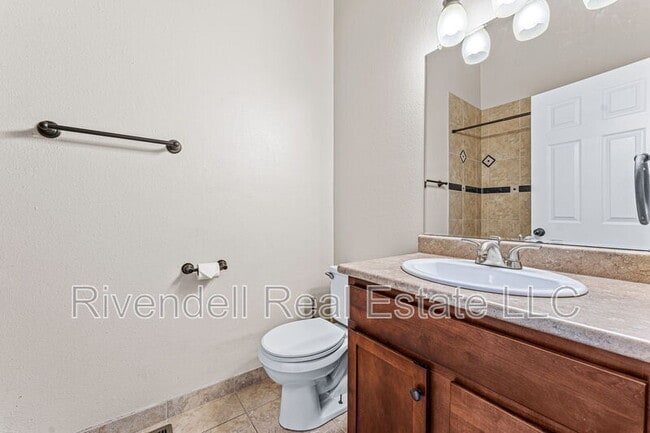 Building Photo - 9695 W Chatfield Ave