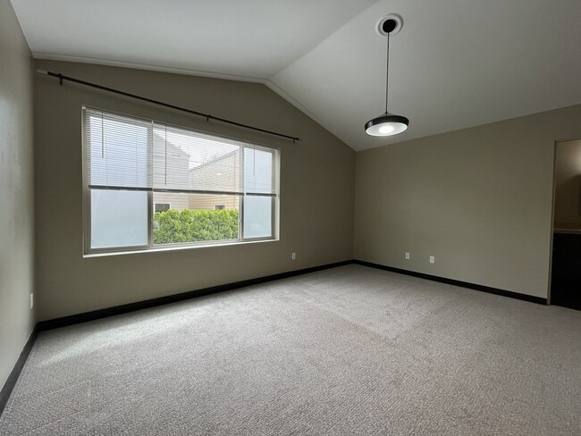 Building Photo - Charming 3 Bedroom, 2.5 Bathroom Home with Large Living Room, Tall Windows, Island Kitchen, and A...