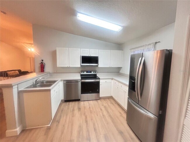 Building Photo - 8825 Grand Palms Cir