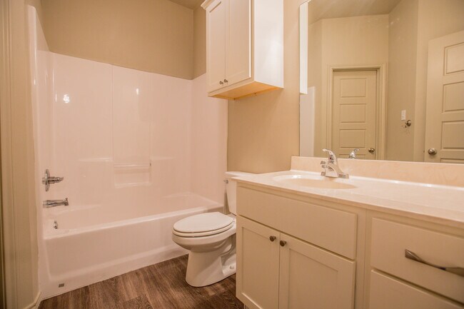 Building Photo - Pre-Leasing - Eye-Catching Home with a Bathroom in Every Bedroom!