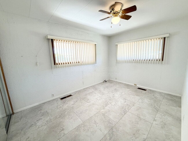 Building Photo - 10675 N Kilimanjaro Ave