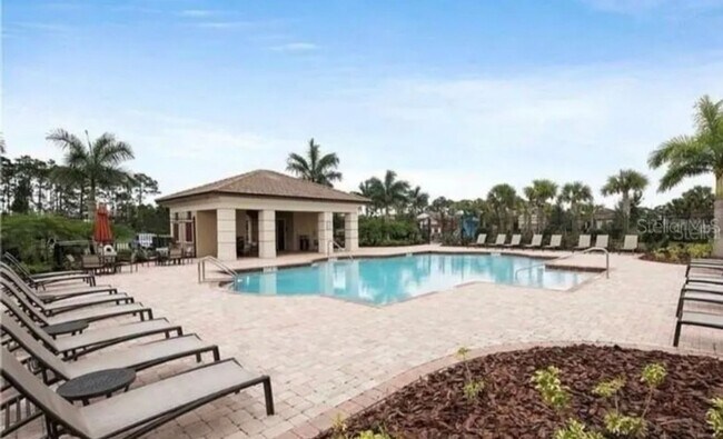 Building Photo - NORTH PORT - Rare Waterfront 4 bedroom pool home Annual/Unfurnished