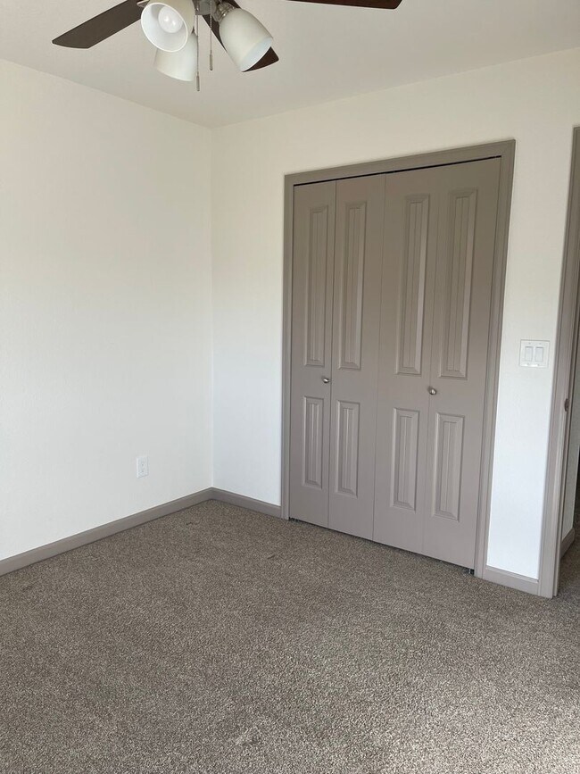 Building Photo - 3 Bedroom 2 Bath With a 2 car garage