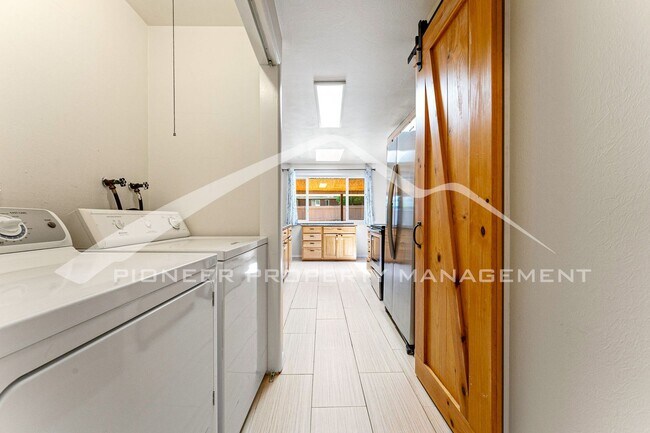 Building Photo - Spacious Home with Fenced Yard and Central AC