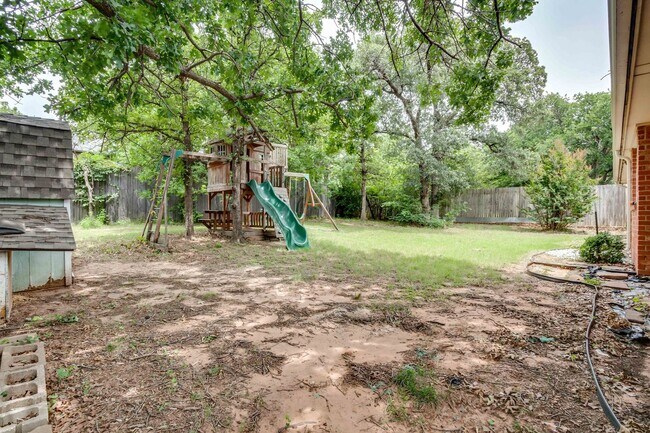 Building Photo - Spacious Retreat with a Park-Like Backyard