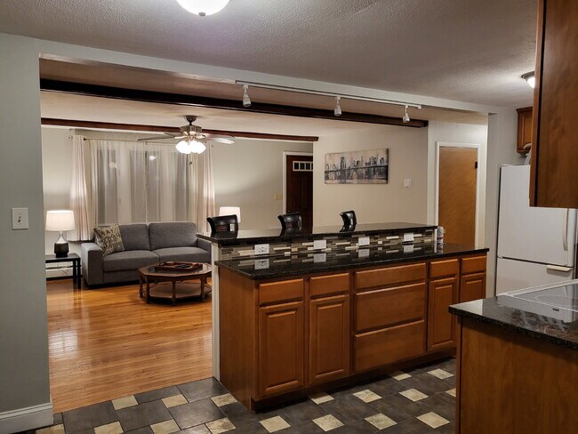 Building Photo - Fully Furnished Pearl Street Retreat in th...