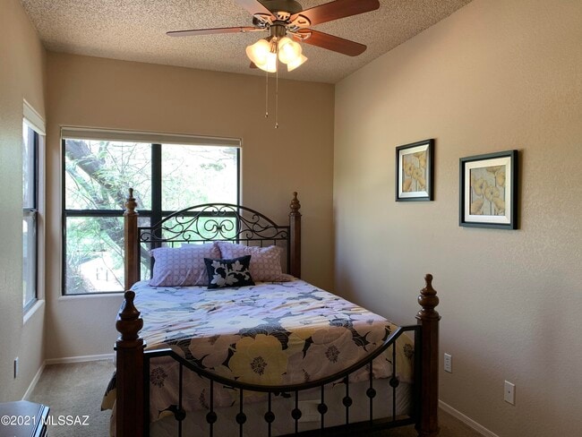 Building Photo - 6655 N Canyon Crest Dr