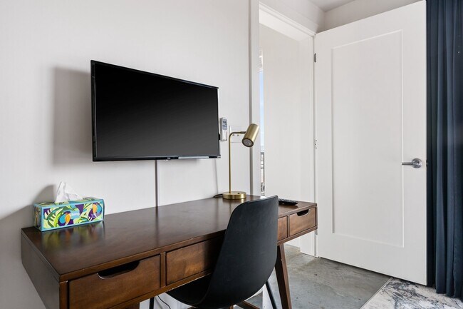 Building Photo - Midtown Magic: Big Savings + Big Perks!