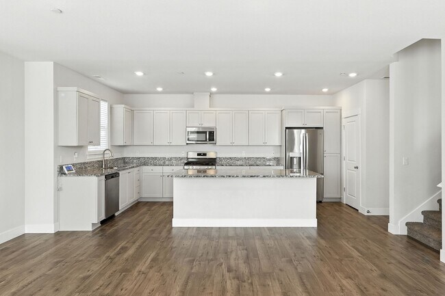 Building Photo - Spacious 4-Bedroom Home, Plus Den/Office with Modern Upgrades and Great Amenities