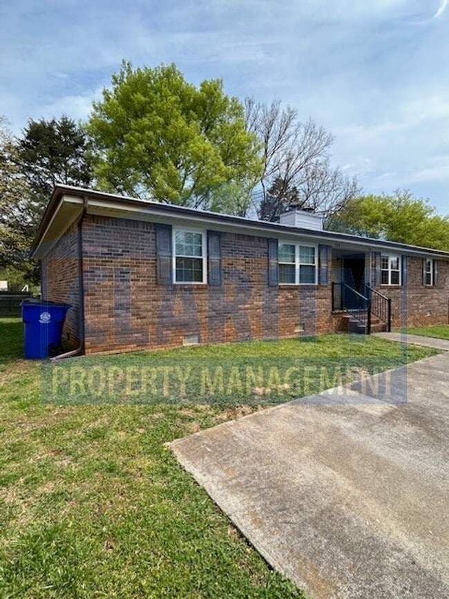 Primary Photo - Two bedroom townhome with fenced in backyard!