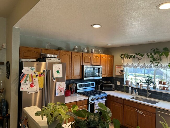 Building Photo - Rare 4BR End-Unit in Northpark with Finished Basement and 2-Car Garage