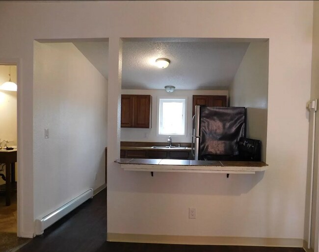 Kitchen view from living room - 3483 Rewak Dr