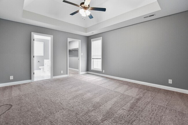 Building Photo - Pet Friendly Three Bedroom with Bonus!